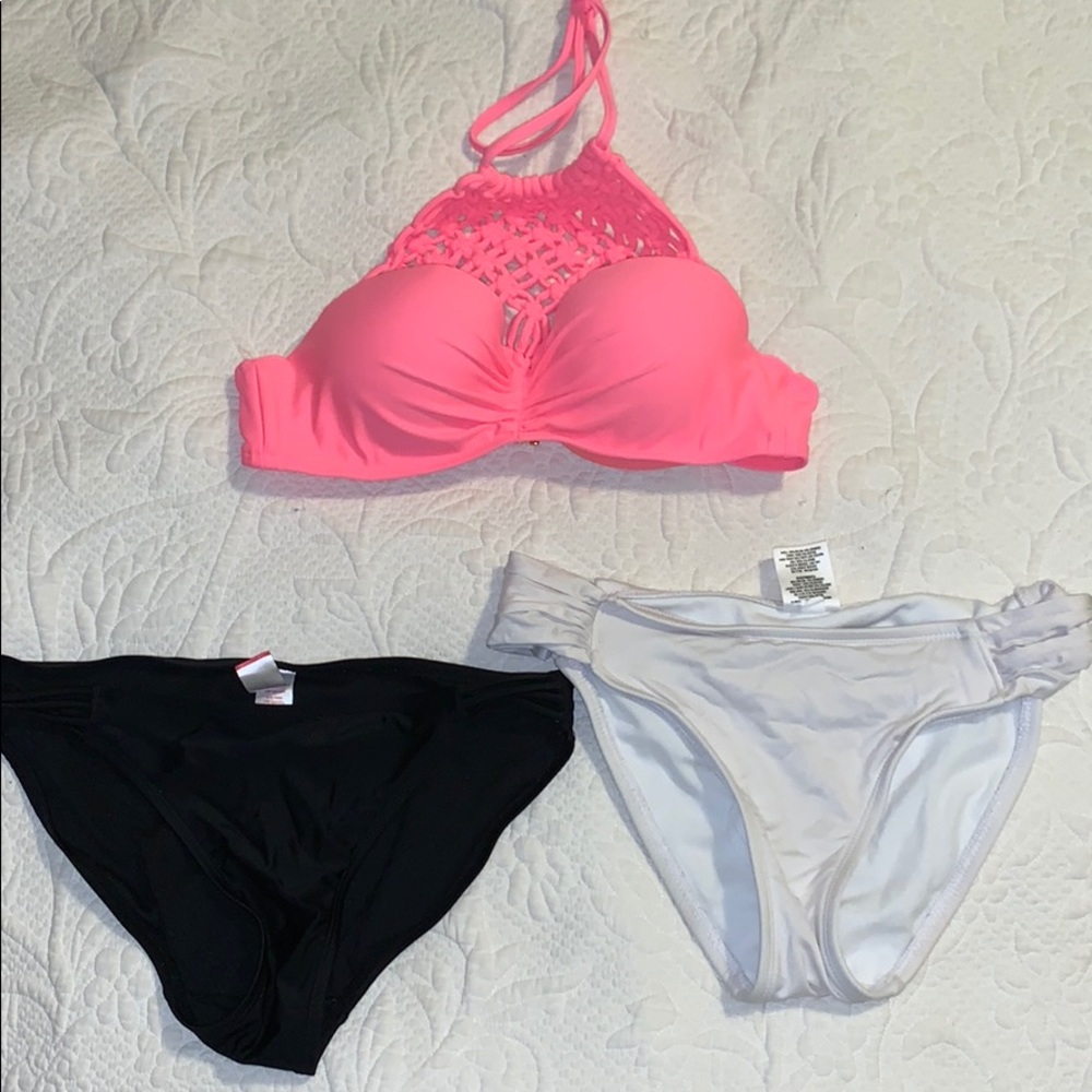 Pinky bathing suit top and black,white bottoms